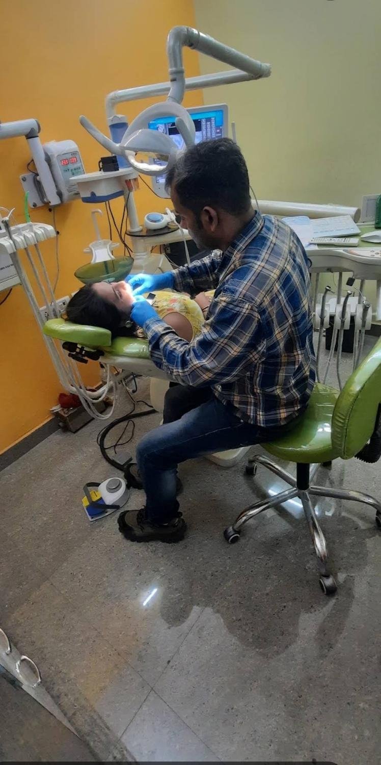 Dr. Ashish Dubey treating a patient